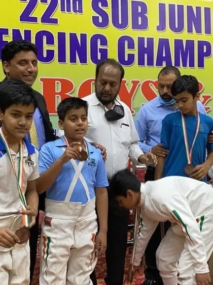 Our young fencers receiving their medals at the 22nd Sub Junior National Championships. These early competitive experiences are crucial for building future champions.