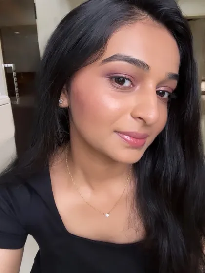 A personal selfie showcasing my signature dewy makeup look. I love creating skin that looks luminous and hydrated, using a mix of strobe creams and highlighters for a "you-dew-you" glow.