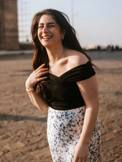 The best portraits come from genuine moments. This candid shot at the Gateway of India captures a moment of pure, uninhibited laughter. My goal is to make you feel so comfortable that your true personality shines right through.