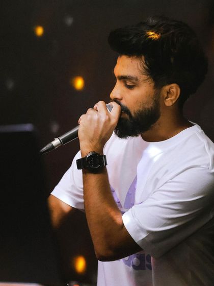 A close-up, artistic shot of me on the mic. The focus is on the passion and emotion I put into every performance.