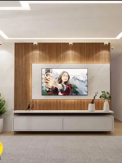 A modern TV unit featuring a combination of a marble panel and wood fluting. The floating design of the console creates a sense of lightness and space.