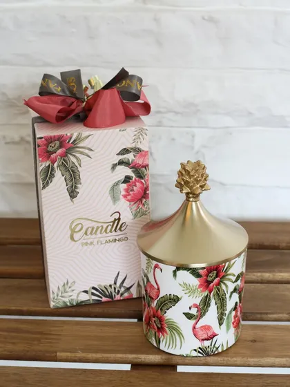 The Pink Flamingo scented candle, with its vibrant floral and flamingo print. It’s a fun and cheerful piece that adds a splash of color and a beautiful aroma to any room.