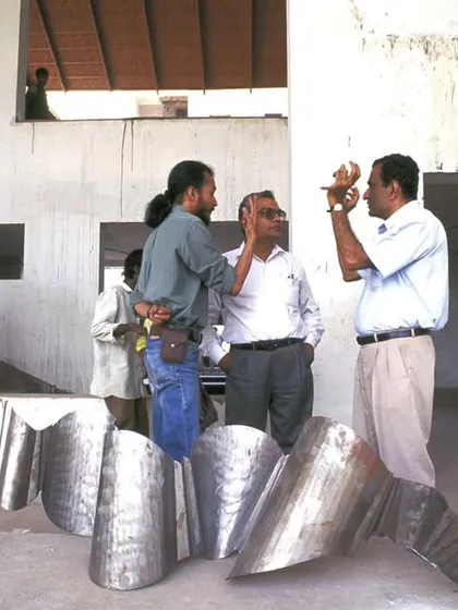On-site discussions with artists and craftspeople are a critical part of our design process. This image captures a working session for the LMW Headquarters, where sculptural elements for the building were being reviewed and refined.