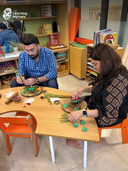 Our Parent Orientations are interactive experiences. Before children join, parents step into the classroom to engage with our Reggio-inspired invitations, gaining a deep, personal understanding of our play-based pedagogy.