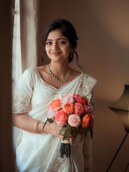 My bride Anju, transformed into a real-life Barbie for her church wedding. We created a dewy, soft glam look that made her glow from within.