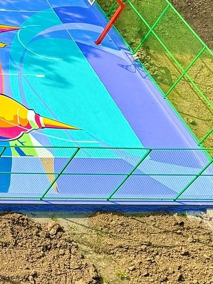 Another detail from the expansive NBA 2K court, showcasing the sharp lines and geometric patterns that guide the eye across the artwork and define different zones of the composition.