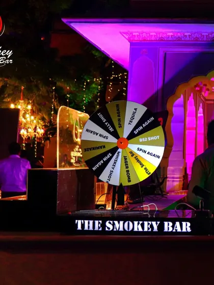 The shot wheel is ready for action at this wedding event. It's a fantastic way to encourage guests to have fun and try different shots, from Tequila to Jager Bombs.