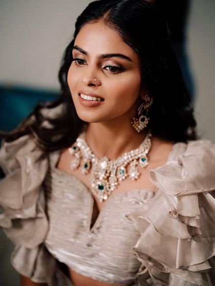 A close-up of the engagement makeup. The focus is on her eyes, with a clean, defined look that makes them pop.