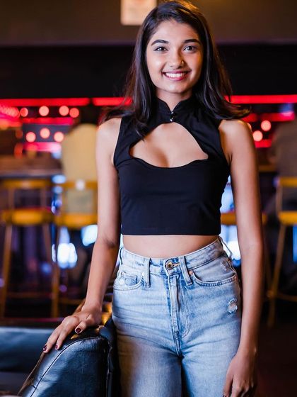 A guest posing at the bar.