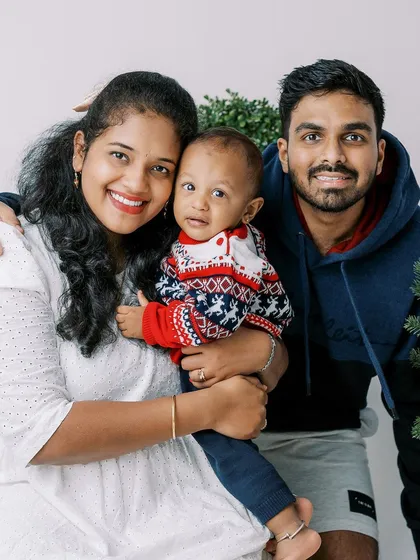 A lovely family portrait from the same Christmas session, capturing their warmth and happiness.