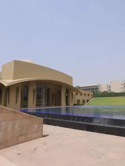 Another shot of the beautiful resort venue, showing the seamless blend of modern architecture and green lawns.