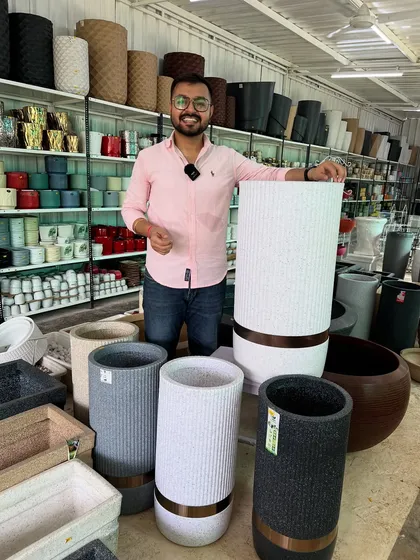 A detailed view of my premium tall roto pots, showcasing the fine texture and the elegant metallic band that sets them apart. These are perfect for creating a sophisticated look in any entryway or living room.