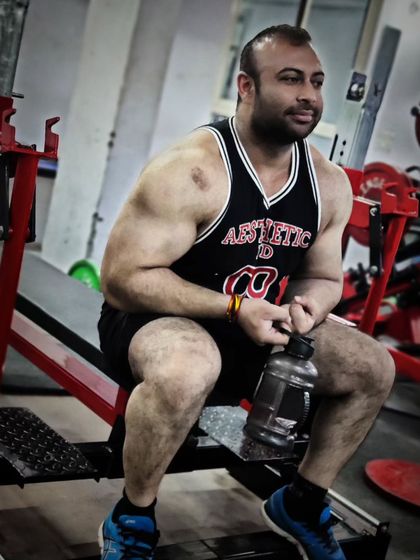 Resting on the bench at Powerlifting Studio. This is my second home.