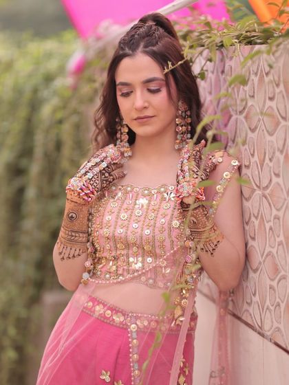 A candid portrait of my Mehndi bride. The makeup is fresh and youthful, perfect for a daytime celebration.