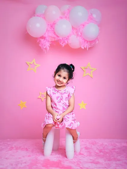 In a Barbie world! This all-pink setup with stars and a fluffy rug is perfect for any child who wants to live out their Barbie dream.