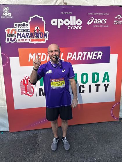 One of our members celebrating after the Apollo New Delhi Marathon. It wasn't about the time, it was about having fun and accomplishing a goal together as a team.