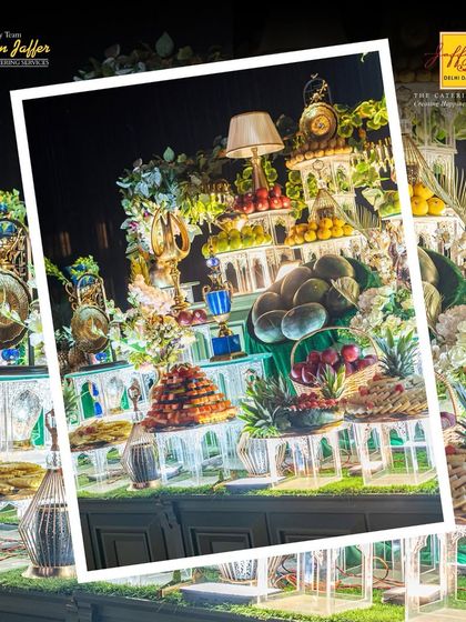 Our fruit counters are a visual masterpiece. This lavish display combines a variety of fresh fruits with decorative elements like lamps and lanterns for a truly luxurious feel.