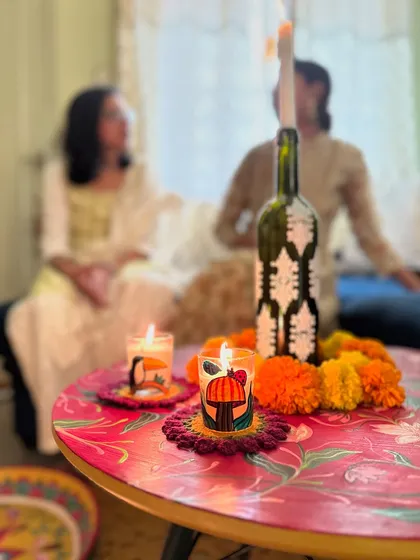 Our quirky candles styled on a festive table setting, ready for a Diwali party.
