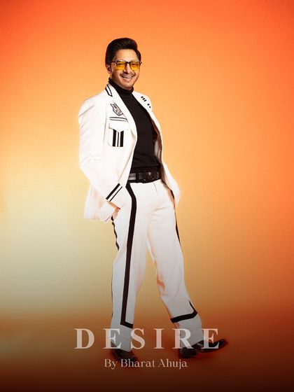 Bold, sleek, and unapologetically you. This white and black striped suit is where fashion meets fierce confidence.