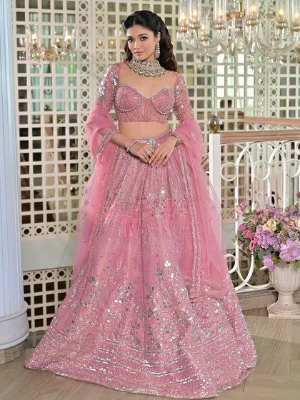 For a Sangeet or cocktail night, a beautifully draped lehenga makes all the difference. I styled this dreamy pink lehenga to ensure it was comfortable enough for dancing while looking absolutely breathtaking from every angle.