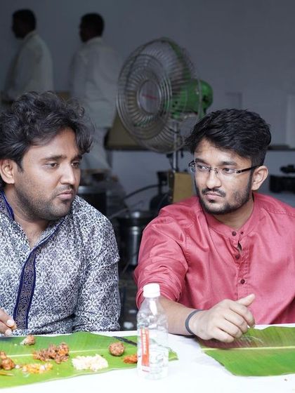 Good food sparks great conversations. Here, guests connect over a delicious banana leaf meal, making memories while enjoying the authentic taste of Karnataka cuisine.
