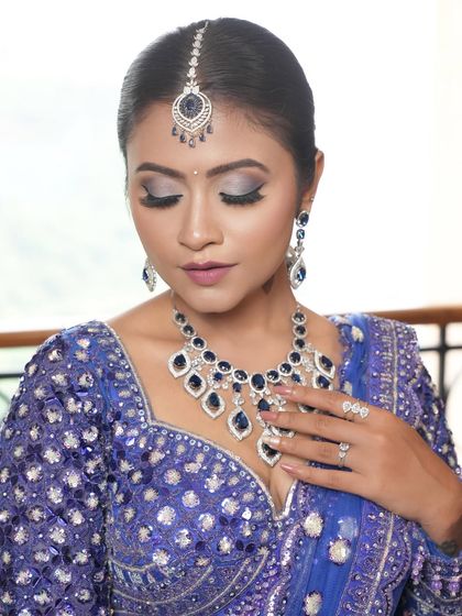 A detailed shot of the blue smokey eye makeup. I used cool-toned shimmers and a soft blend to create a dreamy, dusky look that enhances the eyes without being overpowering.