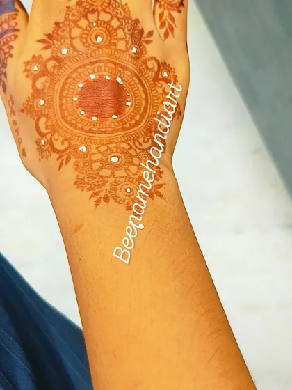 Another beautiful mandala design, this one with more intricate details and shading.