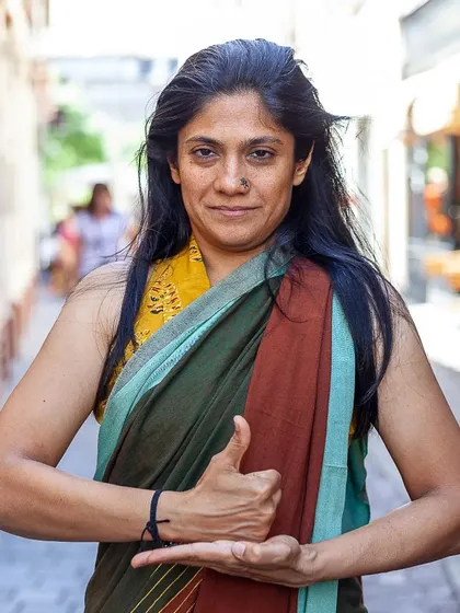 The Shiva Mudra, a hand gesture that integrates the masculine and feminine energies within us. My practice is about finding this balance, transforming darkness into light.