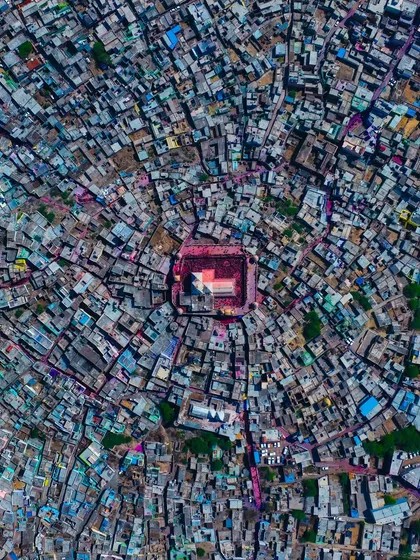 A top-down view of the temple in Barsana, the epicenter of the Holi celebrations. The entire town seems to radiate outwards from this central point of devotion.