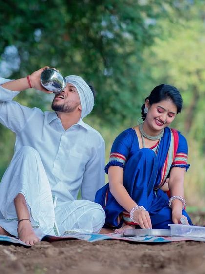 Even simple actions can make for great photos. Here, the groom-to-be takes a drink from a traditional vessel, adding a candid, lifestyle element to the pre-wedding shoot.