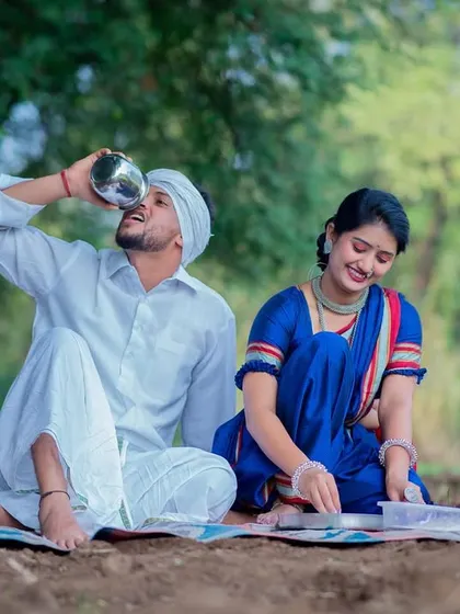 Even simple actions can make for great photos. Here, the groom-to-be takes a drink from a traditional vessel, adding a candid, lifestyle element to the pre-wedding shoot.