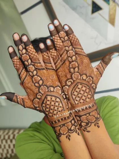 A heavy Indian backhand design with intricate details.