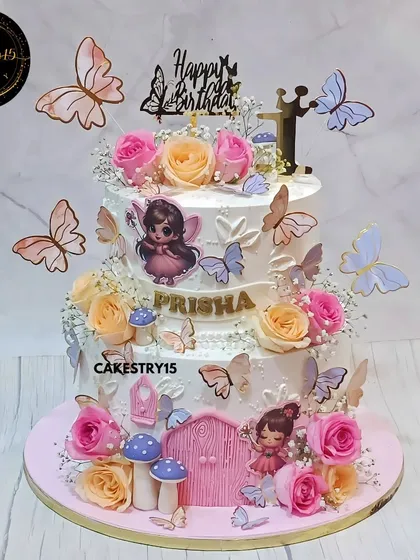 A magical fairy-themed cake for a first birthday. This 3kg pineapple cake is adorned with fresh roses, baby's breath, and a whimsical fairy door, creating a truly enchanting centerpiece.