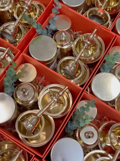 Another view of the brass puja sets, showing the intricate details of the bell and diya. These were a huge hit as a traditional corporate Diwali gift.