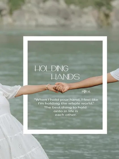 A close-up shot focusing on the couple holding hands, symbolizing their bond and connection.