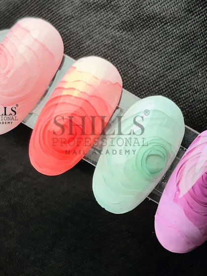 A set of four nails showing the beautiful, soft blooming effect achieved with our Blossom Gel in different pastel colors.