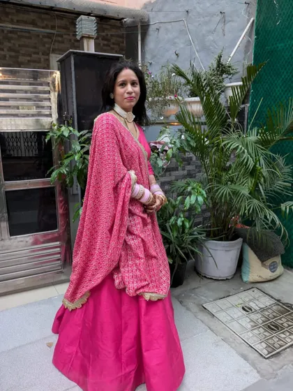 Another look at this lovely pink lehenga, perfect for a daytime wedding function or roka ceremony. The sequined dupatta adds just the right amount of sparkle.