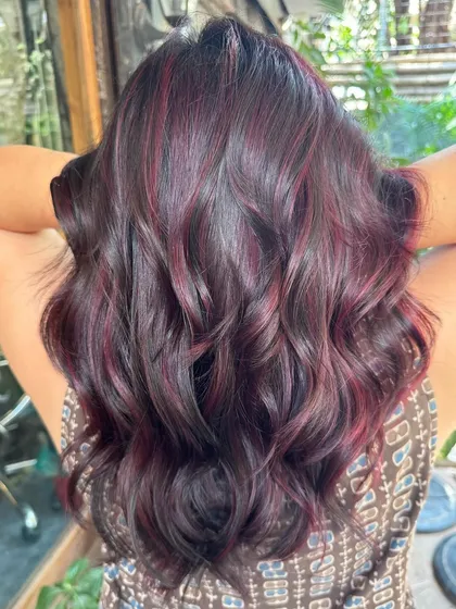 The back of the 'Fiddle Rose' hair. The burgundy tones are subtle yet impactful.