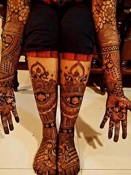 For the complete bridal look, I design intricate patterns that flow from your hands to your feet. This full bridal mehndi set ensures you look perfect from every angle on your big day.