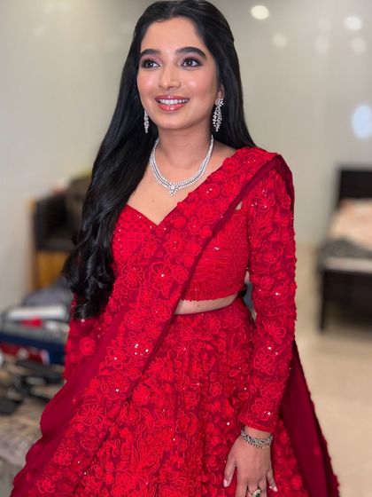 The client looking radiant and happy with her simple yet elegant hairstyle.