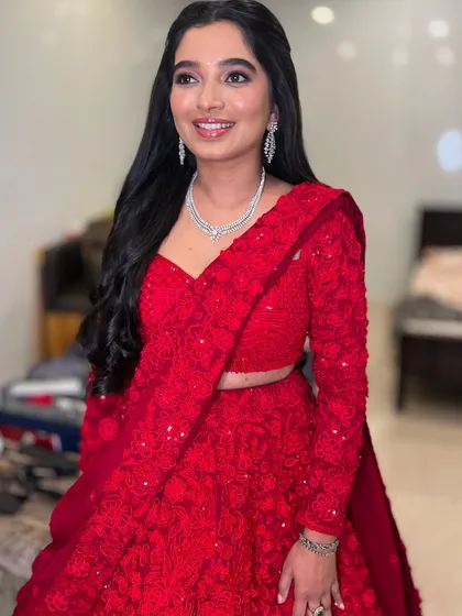 The client looking radiant and happy with her simple yet elegant hairstyle.