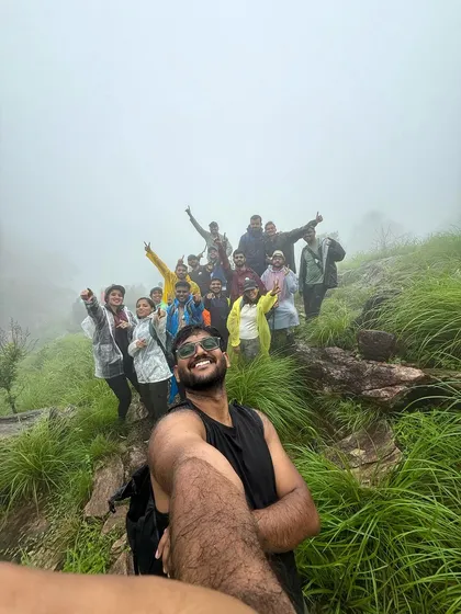 A group selfie from the top of the Bandaje trek. It's moments like these, shared with new friends, that make group trips so memorable.