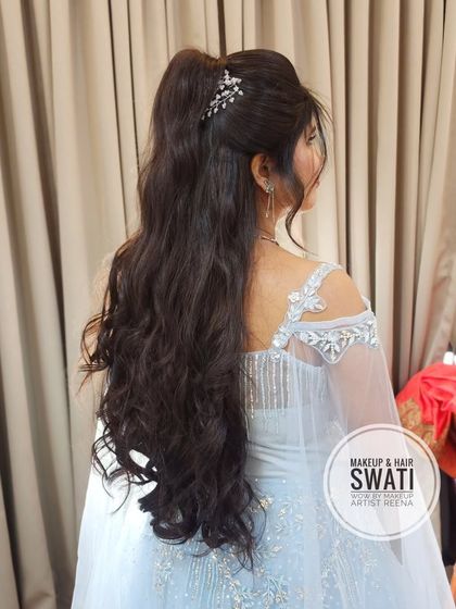 A glamorous high ponytail for an engagement gown. My artist Swati created this look with lots of volume and soft waves.