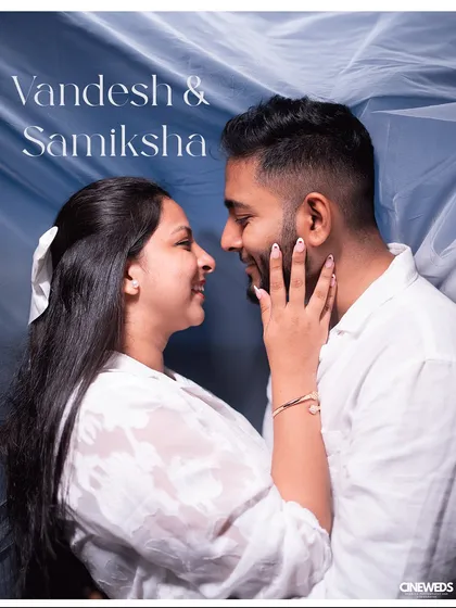 A sweet and intimate portrait from a pre-wedding or engagement shoot. The close-up shot focuses entirely on the couple's happy expressions and loving gaze, capturing a perfect moment of connection.