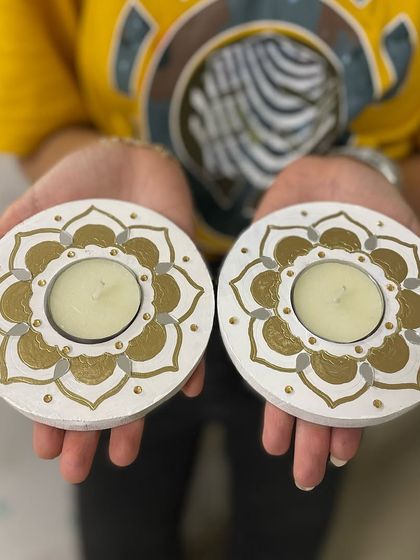 These beautiful, hand-painted tea light holders were created in our studio. They are perfect for adding a touch of elegance to any space.