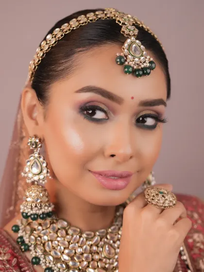 Creating expressive bridal eyes is a key focus. Here, you can see the detailed eyeshadow work and liner application that defines and enhances the eyes, a skill you'll perfect with hands-on practice.