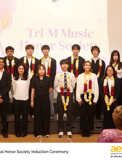 The Tri-M Music Honor Society inducts its newest members. This society recognizes talented student musicians who also demonstrate scholarship, leadership, and a commitment to service.