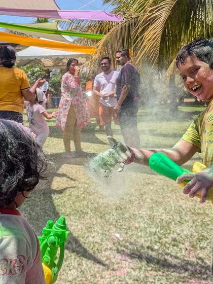 The kids led the charge at our Holi celebration, chasing each other with gulal and embracing the joyful chaos of the festival.