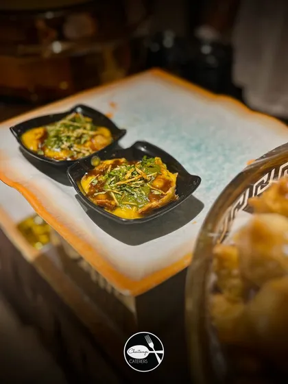 My Samosa Ragada Chaat is pure comfort food. I serve it in individual portions, with a crushed samosa topped with hot ragada, tangy chutneys, and a sprinkle of sev for that perfect crunch.