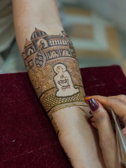 For clients who want to include spiritual elements, I can create designs that incorporate deities or symbols that are meaningful to them, like this Shree Swami Samarth motif.